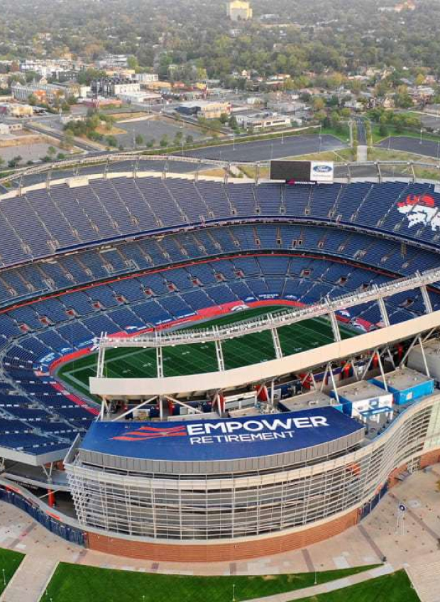 Aerial view of large football stadium in city